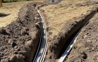 Utility ditching, water tap, power connection, property preparation, property clearing